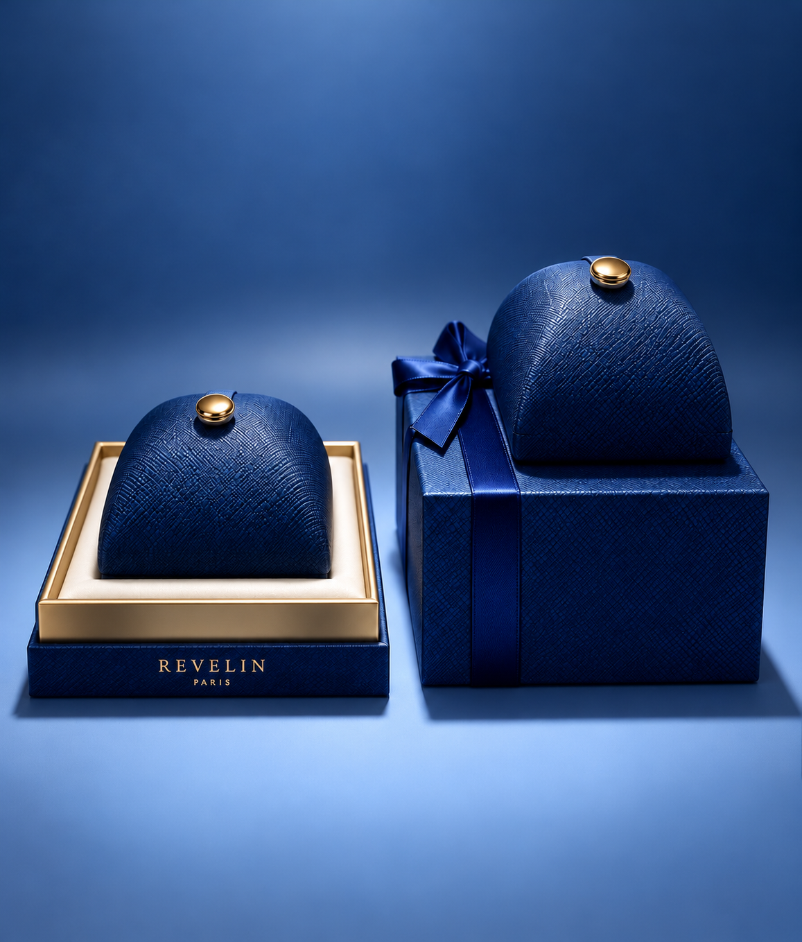 Revelin presentation boxes in sapphire blue with gold detailing
